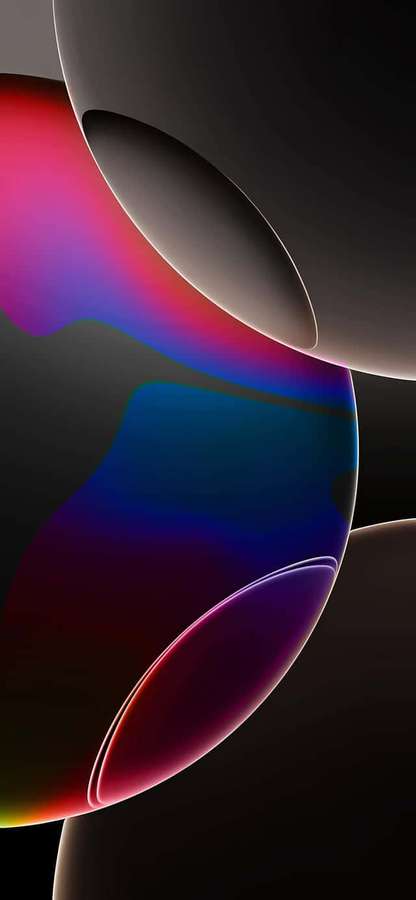 Schwebende bunte Kugeln mit sanften Farbverläufen vor einem dunklen Hintergrund. — iPhone 16 Wallpaper