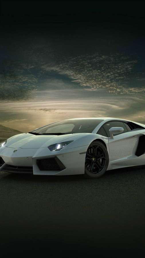 White Lamborghini Aventador parked at dusk with dramatic sky background. — iPhone Lamborghini Wallpaper