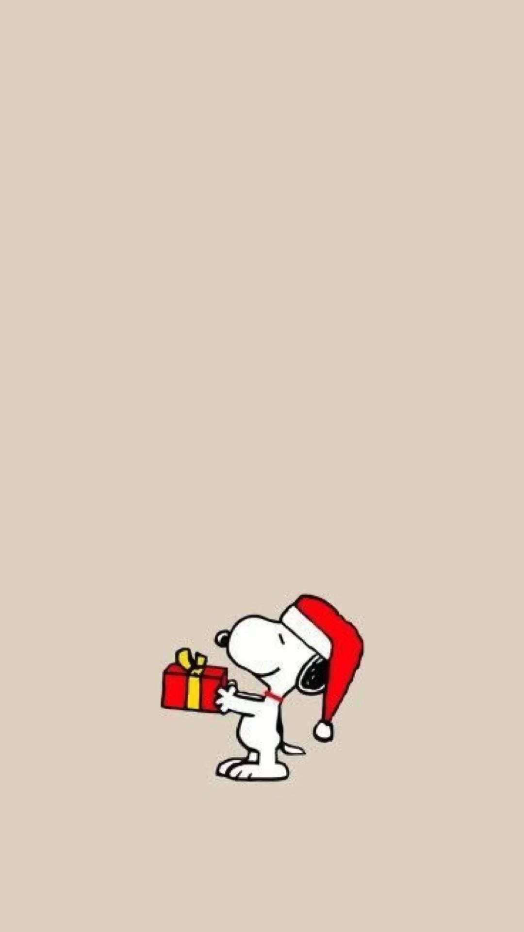 Snoopy med tomteluva som håller en inslagen presentask. — iPhone Lås skärm bakgrund Bakgrundsbilder