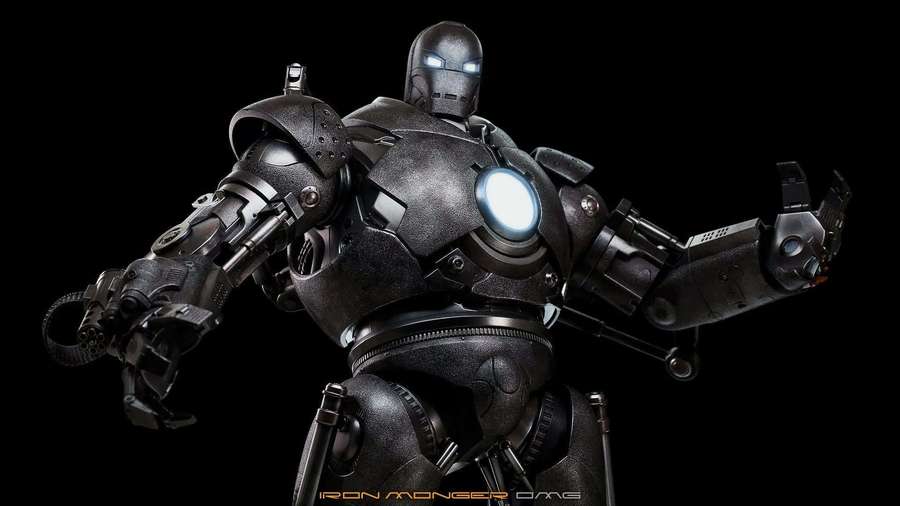 Black armored Iron Monger with glowing blue eyes and chest reactor. — Iron Monger Wallpaper