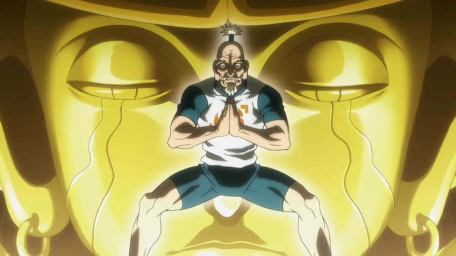 Anime character kneeling in prayer before a giant golden Buddha statue. — Isaac Netero Wallpaper