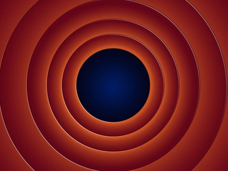 Koncentriska röda ringar som tonar in i en mörkblå mitt och skapar en tunnelillusion. — Det är Bakgrundsbilder