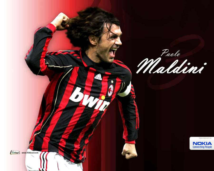 Paolo Maldini con la maglia del Milan festeggia un gol. — Italia Sfondi