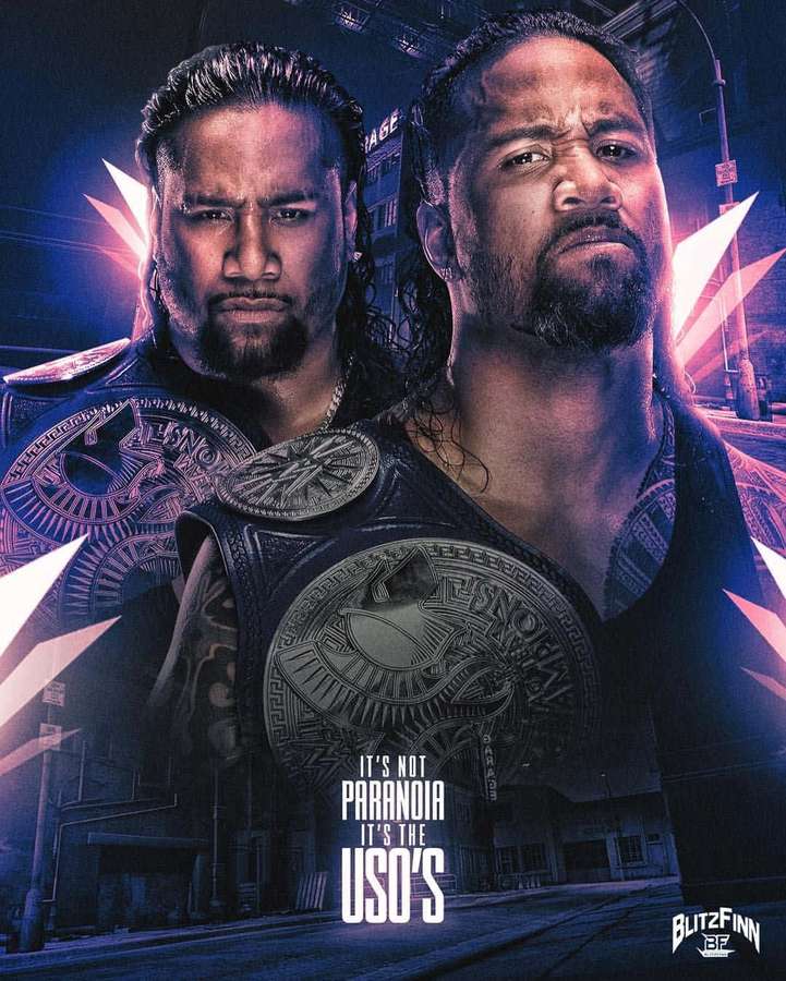 Two wrestlers in championship gear stare intensely in a neon-lit city street at night. — Jey Uso Wallpaper