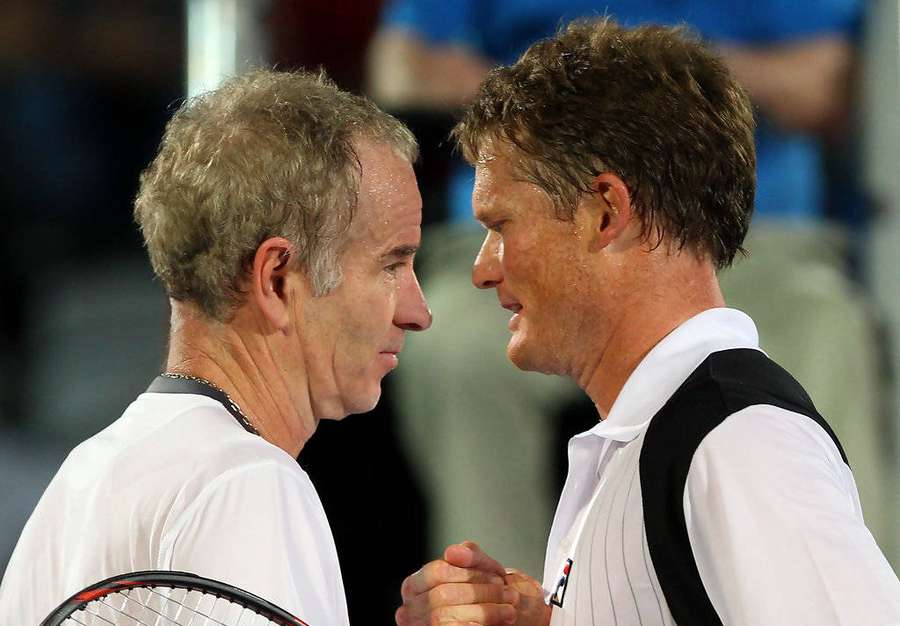 Two male tennis players shaking hands after a match. — John Mcenroe Background