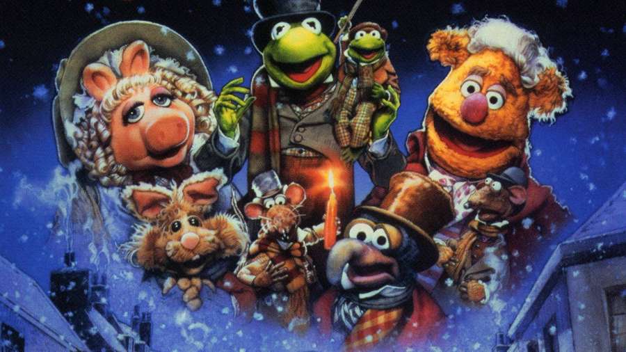 Muppet-hahmot talviasuissa pitävät kynttilää lumista yötaivasta vasten. — Joululaulu Taustakuvat