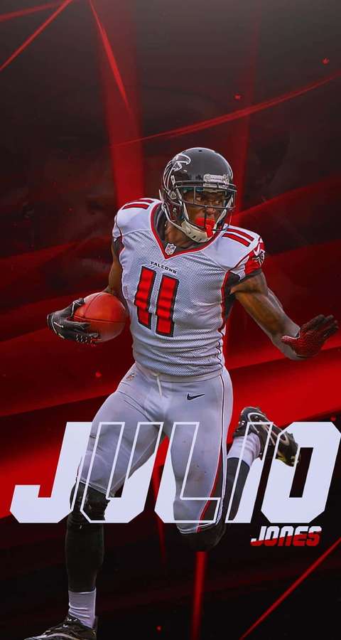 Football player Julio Jones in Falcons uniform running with ball. — Julio Jones Wallpaper