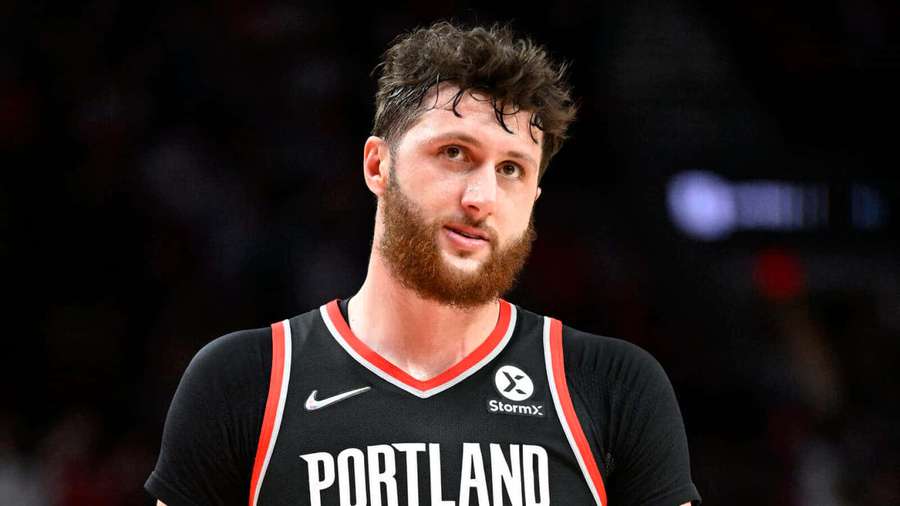 Professional basketball player in Portland jersey on court — Jusuf Nurkic Wallpaper