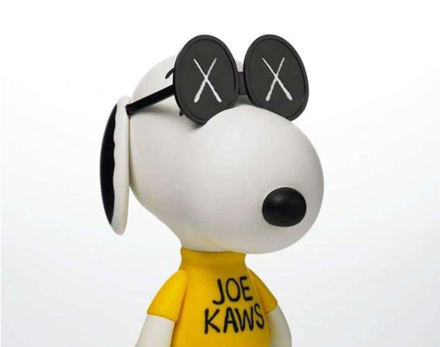 Snoopy figurine in yellow Joe Kaws shirt and black X sunglasses. — Kaws Snoopy Wallpaper