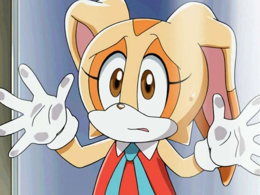 Yllättynyt animekettuhahmo punaisessa paidassa ja sinisessä solmiossa elehtien käsillä. — Kermakani Taustakuvat