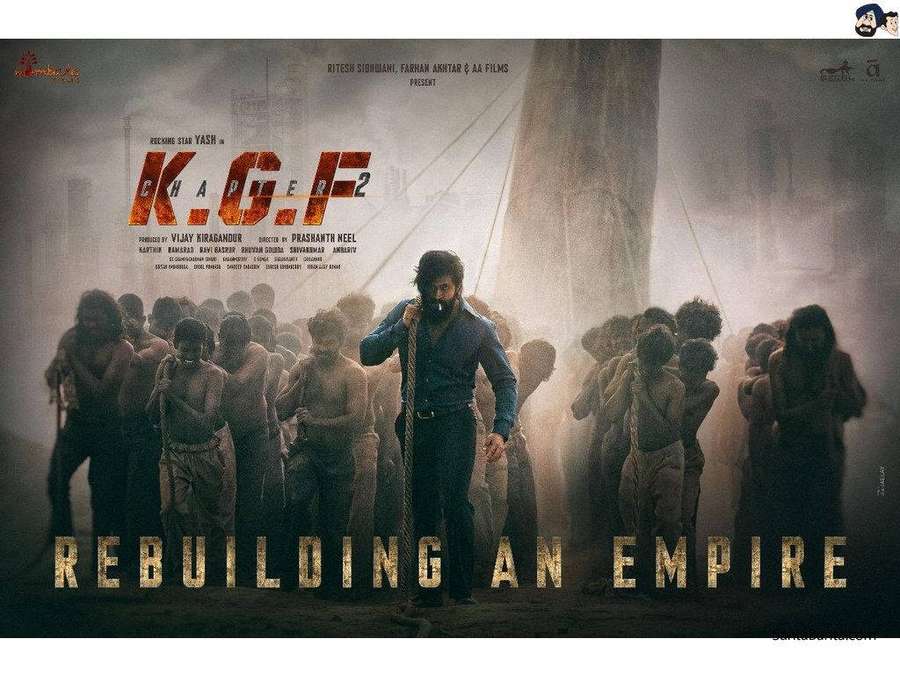 Film poster for K.G.F Chapter 2 showing a man with a rope surrounded by shirtless men in smoke. — Kgf 2 Wallpaper