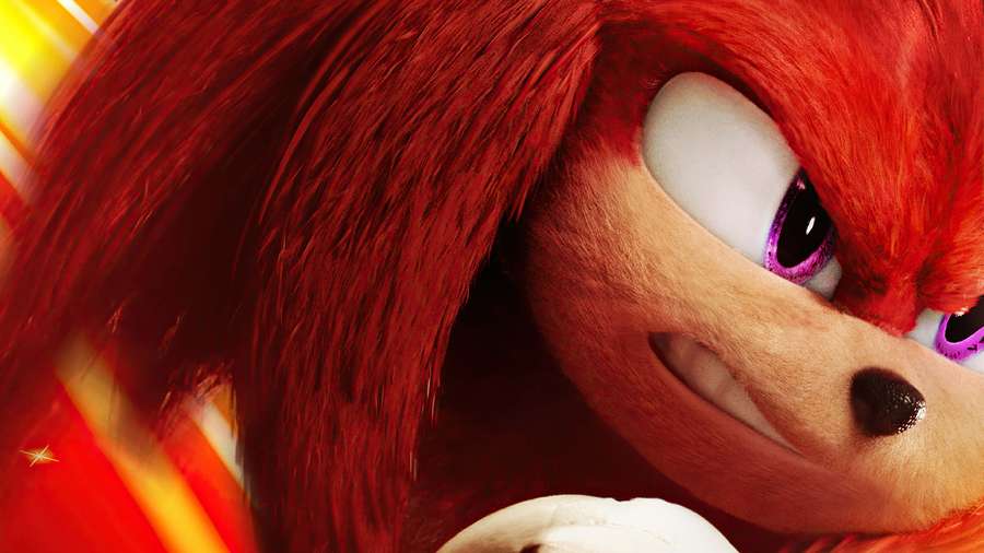 Close-up of Knuckles the Echidna with intense purple eyes and fiery red quills. — Knuckles Background