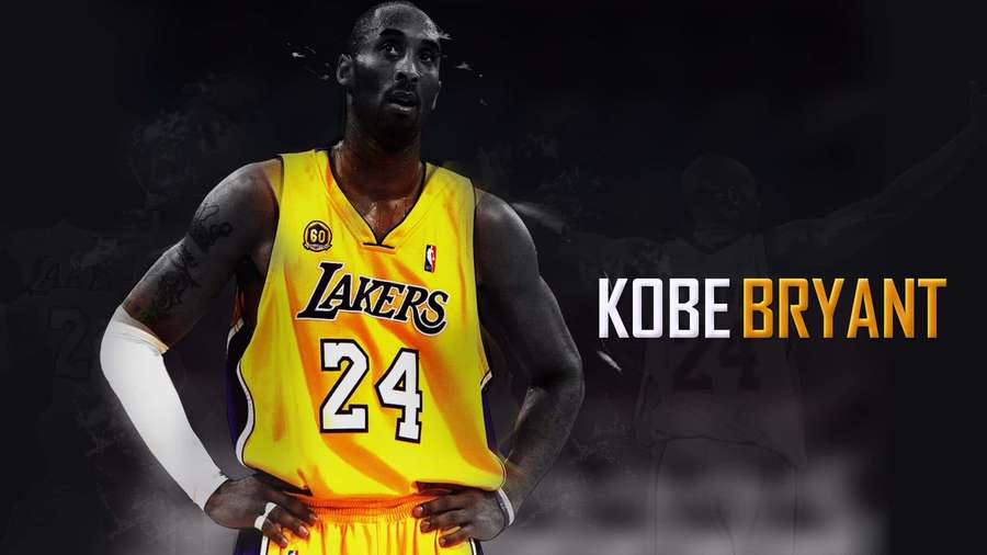 Kobe Bryant in Lakers jersey with number 24 standing confidently. — Kobe Background