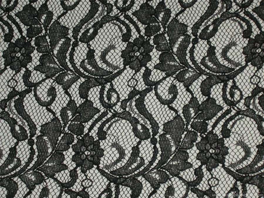 Black floral lace fabric with detailed embroidery on a mesh background. — Lace Background