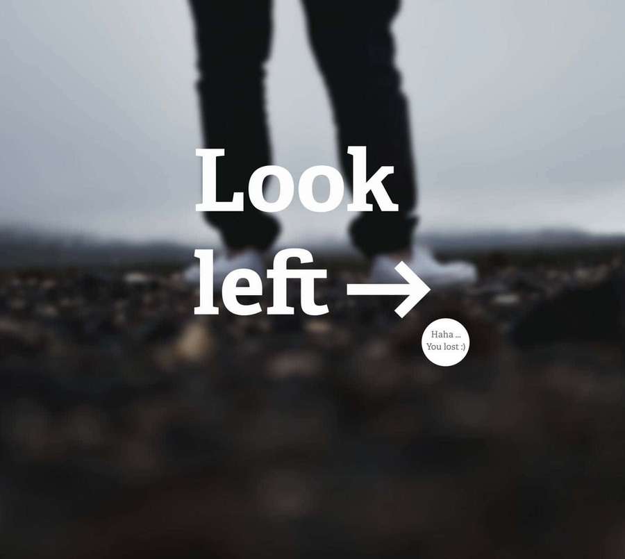 Person's legs on rocky shore with humorous text pointing left — Left Wallpaper