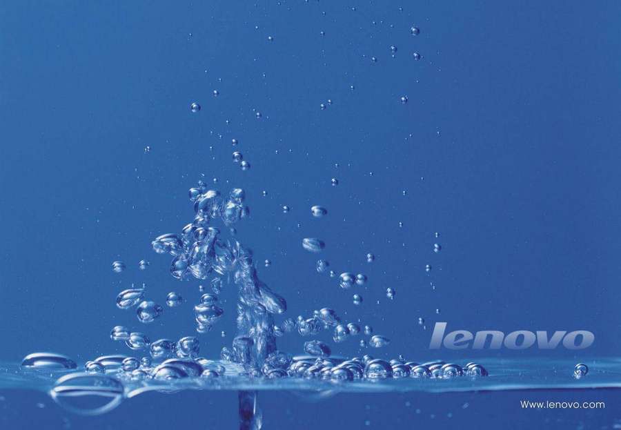 Water splash with bubbles rising in blue liquid — Lenovo Background