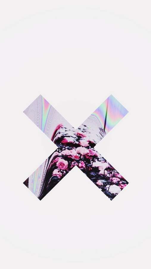 An X made of iridescent tape over a floral pattern on white background. — Letter X Wallpaper