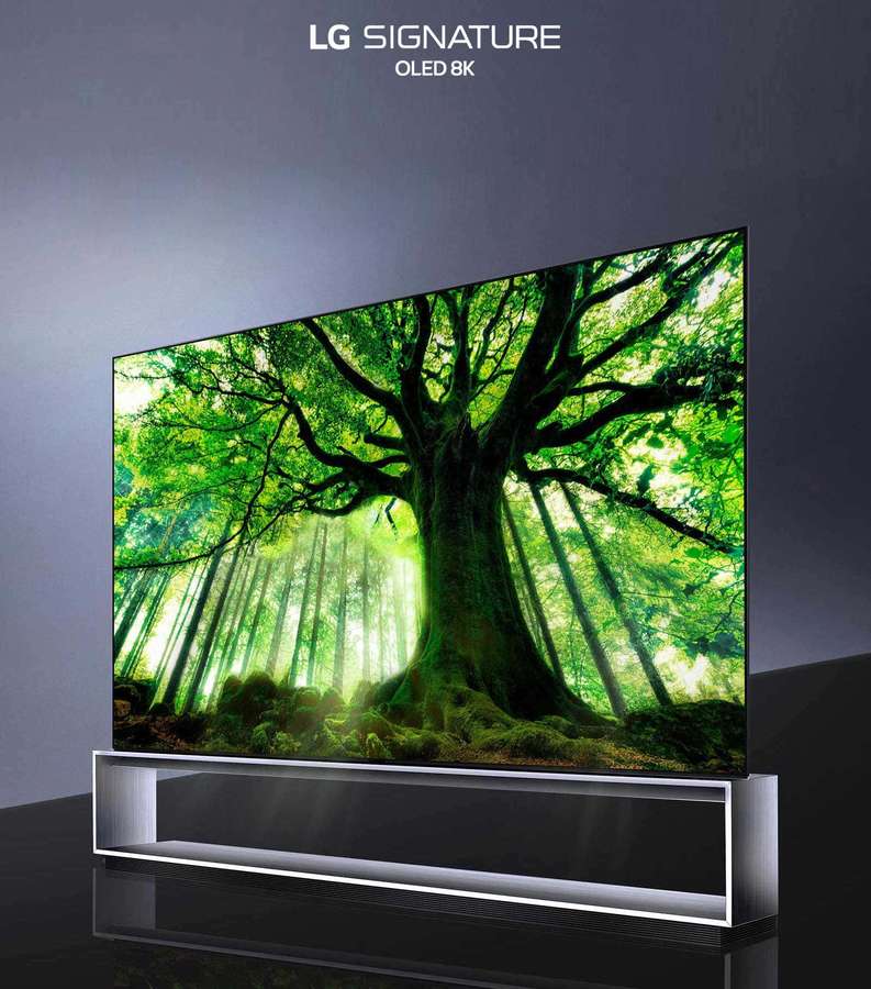 LG Signature OLED TV zeigt einen leuchtenden Wald mit einem großen Baum und Sonnenstrahlen. — Lg Bilder