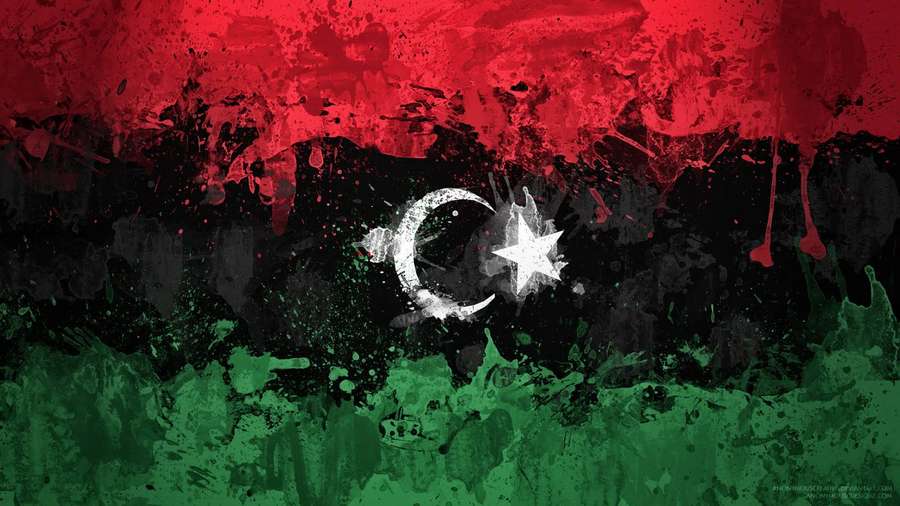 Libyan flag with red black and green stripes and white crescent and star in splattered paint style. — Libya Wallpaper