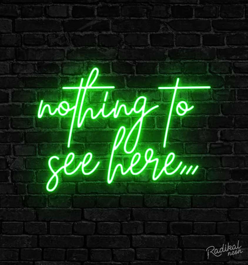 Green neon sign saying nothing to see here on a dark brick wall. — Lime Green Aesthetic Wallpaper