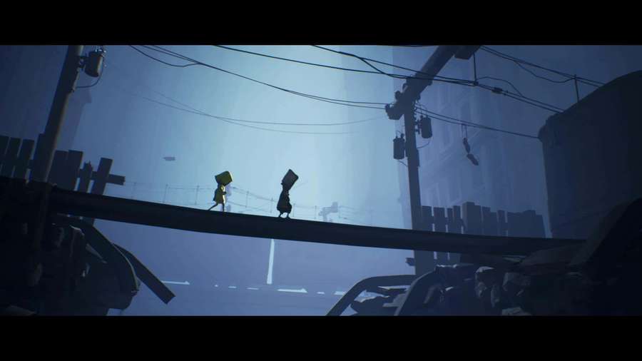 Two children silhouetted walking on a beam in a misty ruined city at dusk. — Little Nightmares Background