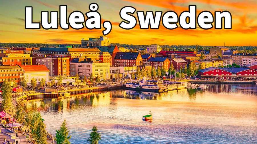 Luleå Sweden waterfront at sunset with colorful buildings and boats on calm water. — Luleå Wallpaper