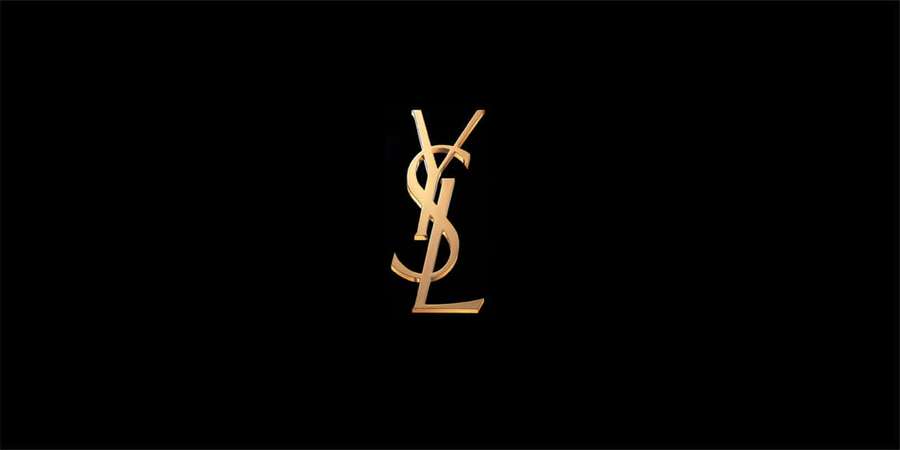 Golden YSL logo on black background — Luxury Brands Wallpaper