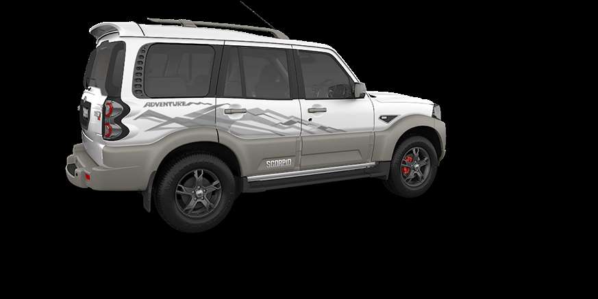 White and beige adventure SUV with mountain graphics and red brake calipers. — Mahindra Scorpio Wallpaper