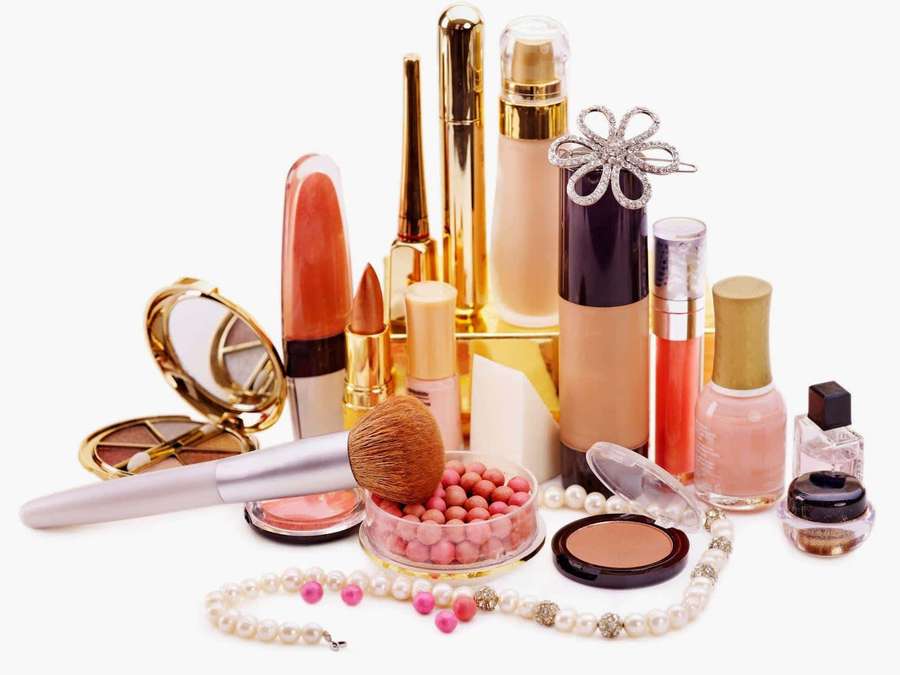 Collection of makeup products and accessories on white background — Makeup Background