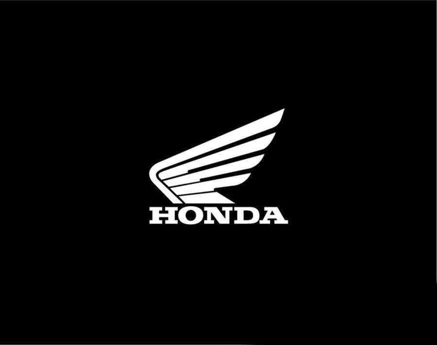 Logotipo blanco del ala de Honda sobre fondo negro con texto debajo — Marcas Fondos de pantalla