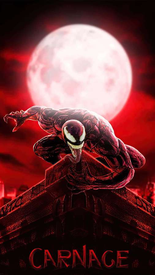 Carnage perched on a rooftop under a red moon in a dark cityscape. — Marvel Carnage Wallpaper