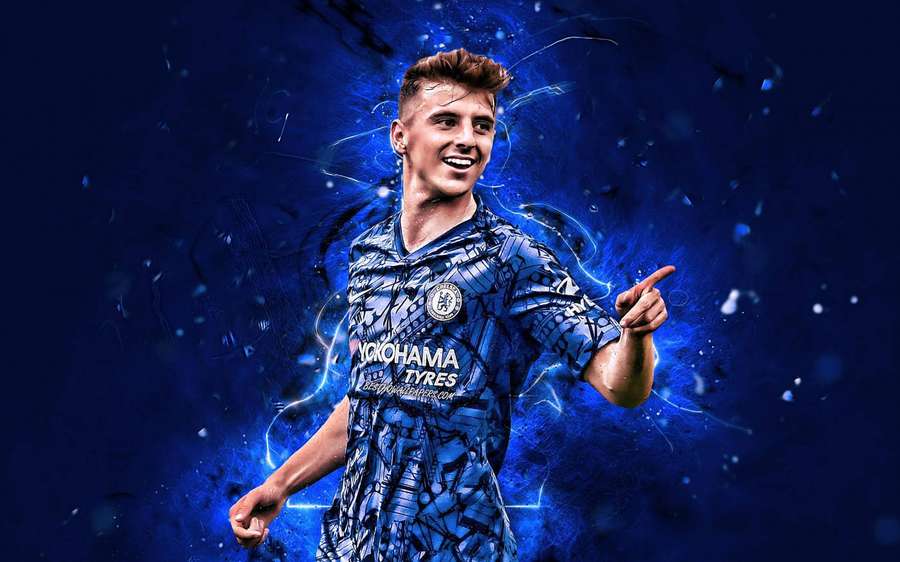 Football player celebrating in blue jersey with electric effects and confetti. — Mason Mount Background