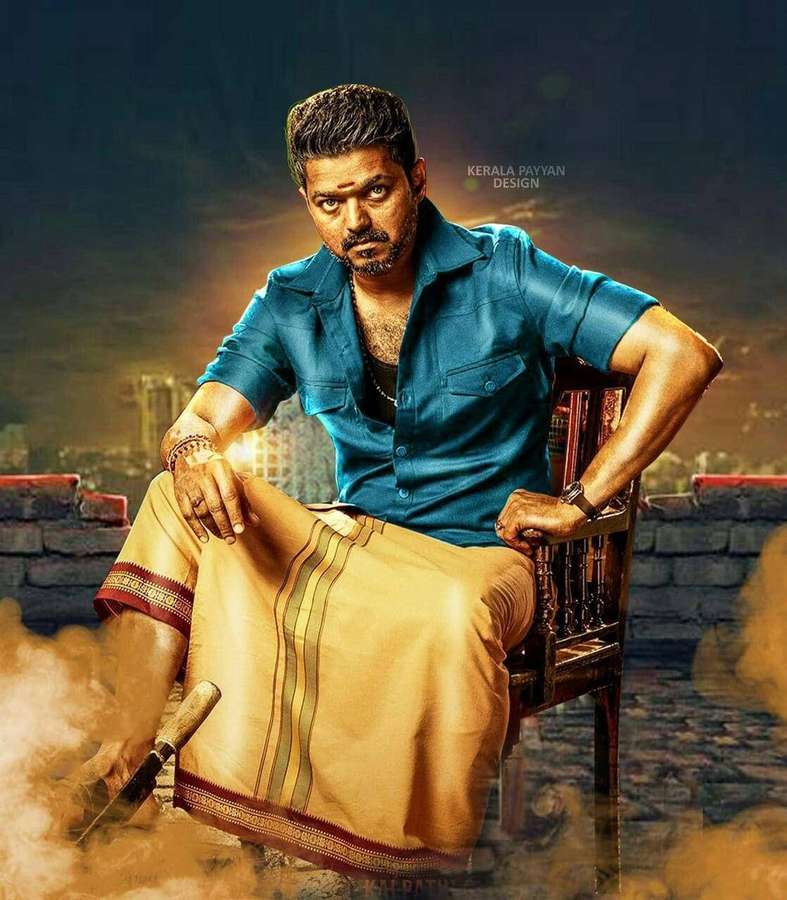 Man in blue shirt and beige dhoti sitting on chair with knife at feet in smoky urban setting. — Master Vijay 4K Wallpaper