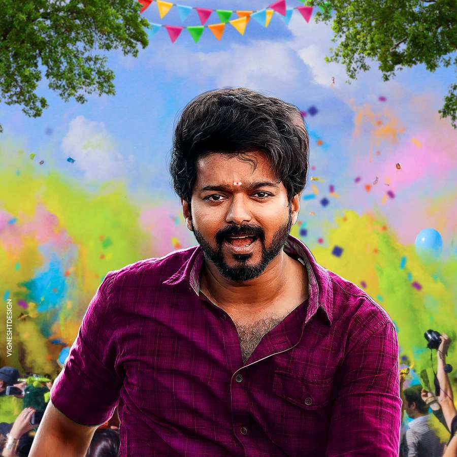 Man at colorful festival with confetti and bunting — Master Vijay HD Wallpaper