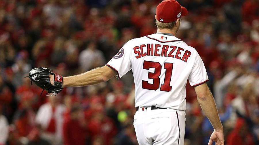 Baseball pitcher Scherzer walks off field after game. — Max Scherzer Background