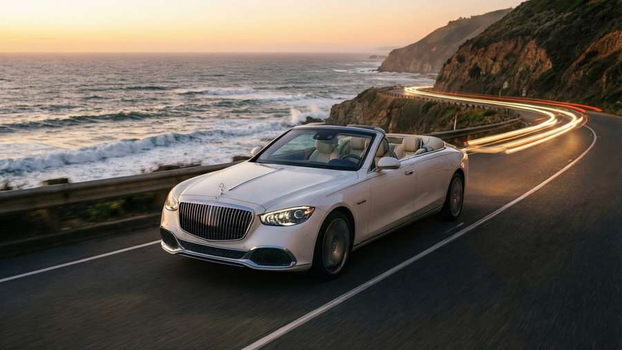 Maybach Landaulet cruising a coastal road at sunset. — Maybach Landaulet Wallpaper