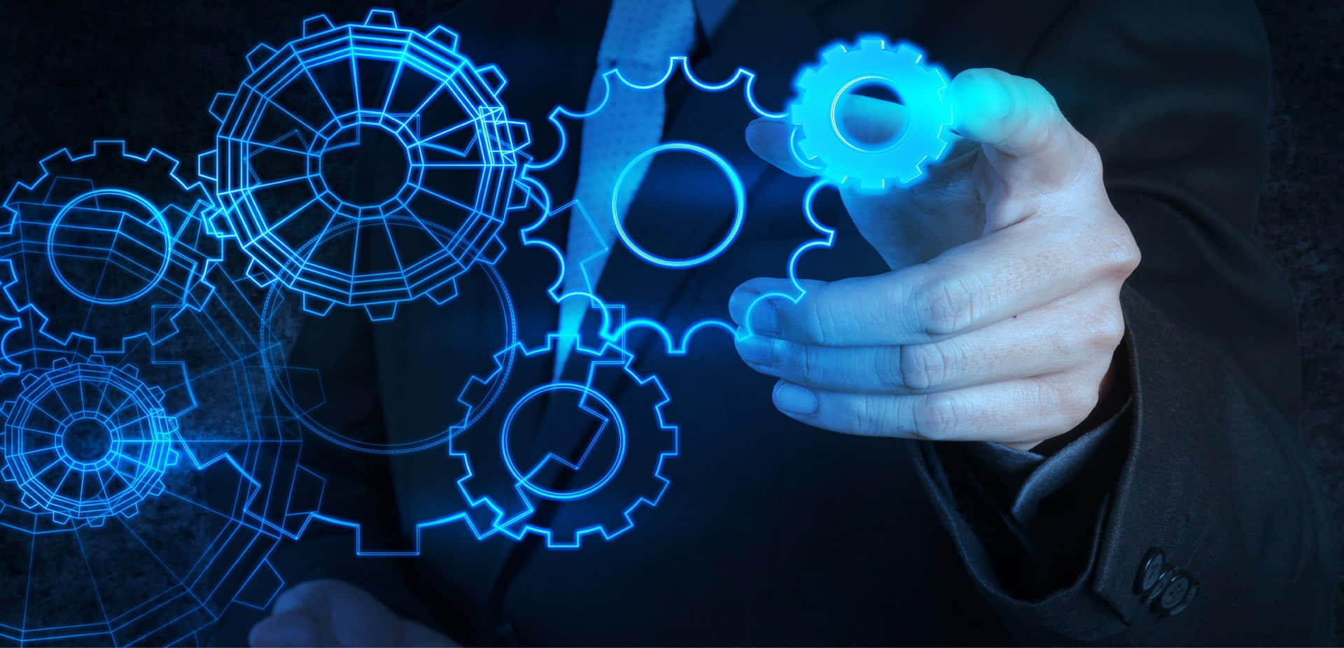 Hånd monterer lysende blå digitale tannhjul i et mørkt miljø. — Mechanical Engineering Bakgrunner