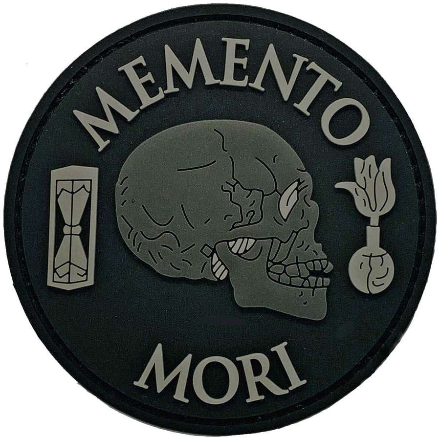 Circular patch with skull, hourglass, tulip, and Latin phrase Memento Mori. — Memento Mori Wallpaper