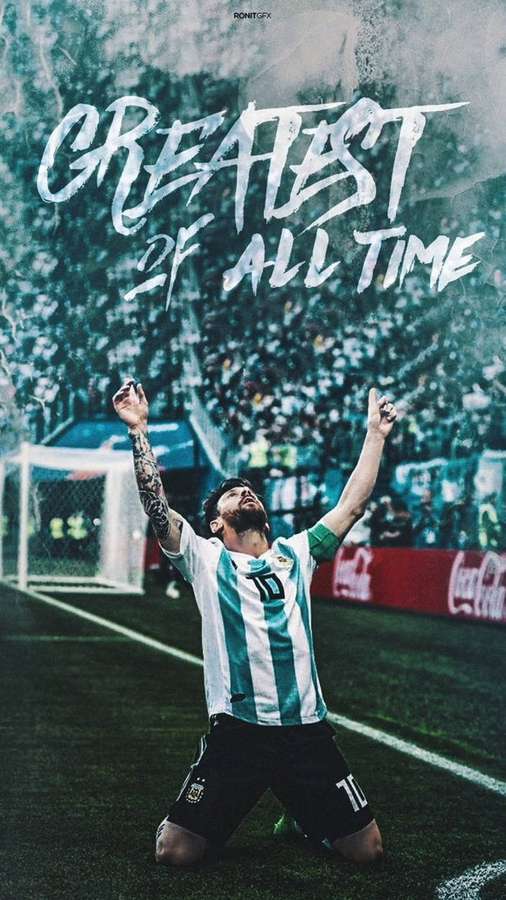 Football player in Argentina jersey celebrating victory on stadium field with crowd behind. — Messi Argentina Wallpaper