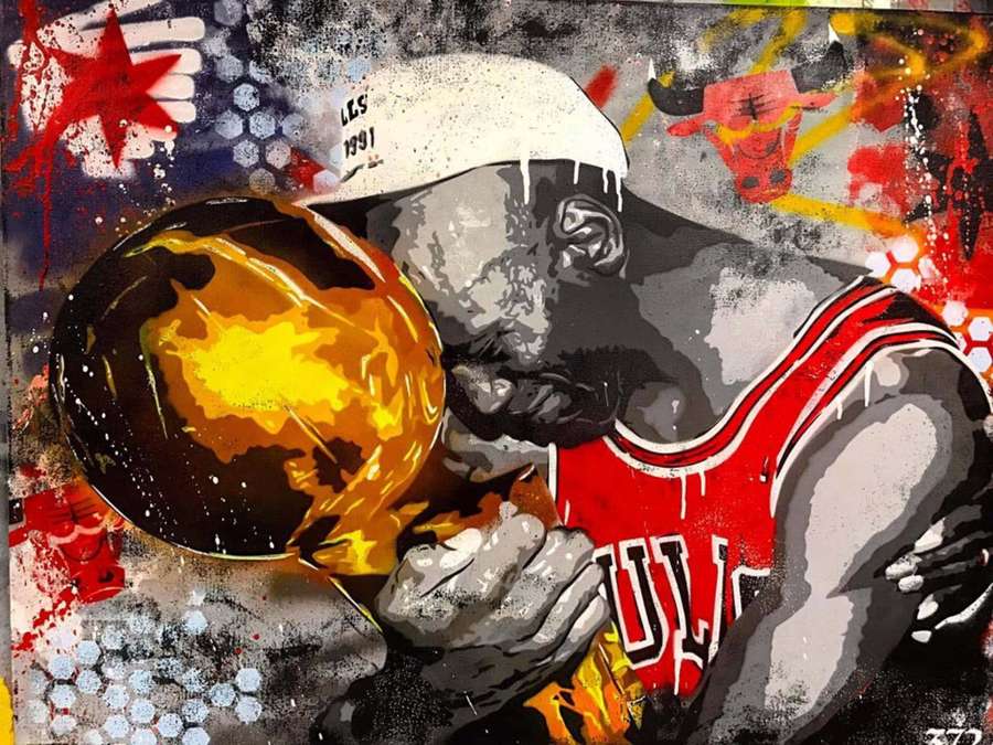 A basketball player kissing a flaming ball in a graffiti-covered urban scene. — Michael Jordan Background