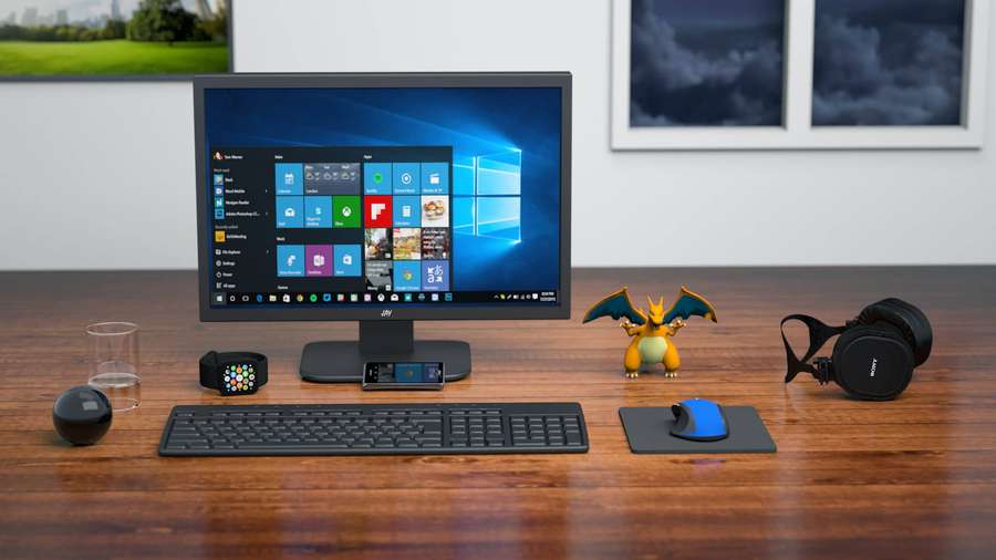 Tech-Schreibtisch mit Computermonitor, Gaming-Zubehör und Pokemon-Figur — Microsoft Desktop Bilder