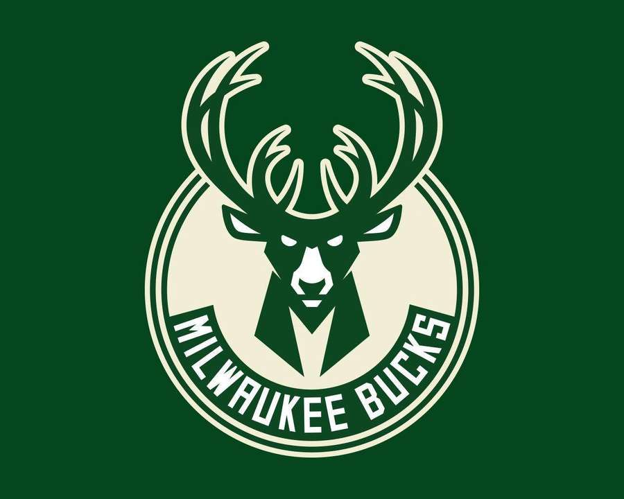 Milwaukee Bucks basketball team logo with deer head in cream and green. — Milwaukee Wallpaper
