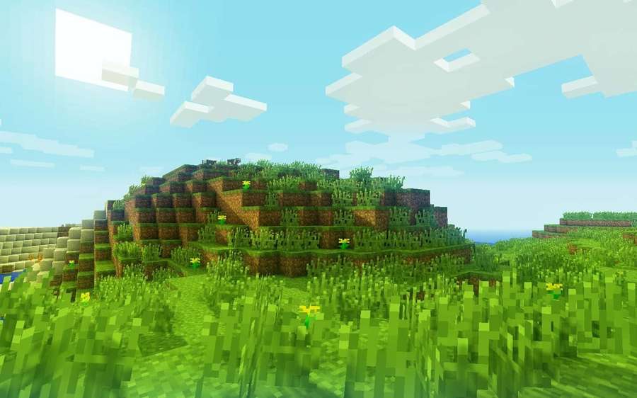 Lohkomainen vihreä kukkula kukkien kanssa sinisen taivaan alla valkoisten pilvien kanssa Minecraftissa. — Minecraft Kartta Taustakuvat