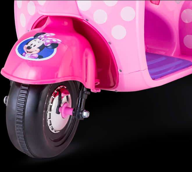 Pink Minnie Mouse scooter with white polka dots and cartoon character sticker. — Mini Mouse Wallpaper