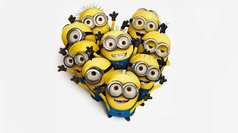 Group of Minions forming a heart shape with big eyes and blue overalls. — Minion Background