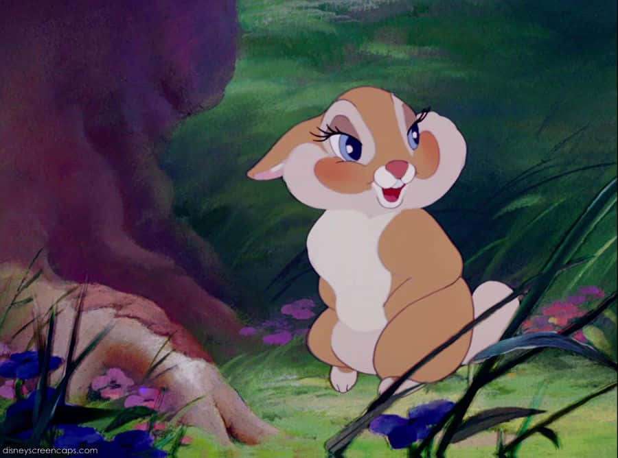 A cartoon bunny with blue eyes sits in a grassy forest with purple flowers. — Miss Rabbit Wallpaper