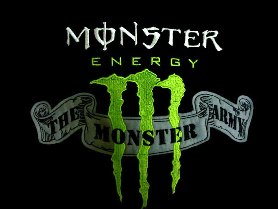 Monster Energy logo with green M and banner reading The Monster Army on black background. — Monster Background