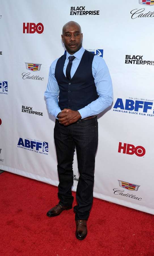Man in formal attire posing on red carpet at film festival. — Morris Chestnut Wallpaper
