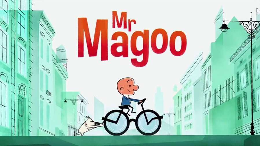 Cartoon man on bicycle with dog pulling, in green city street, title Mr Magoo. — Mr Magoo Wallpaper
