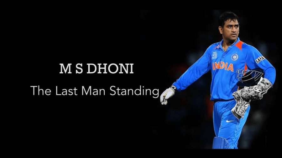 Cricket player M S Dhoni in blue India uniform holding helmet with text The Last Man Standing. — Ms Dhoni Background
